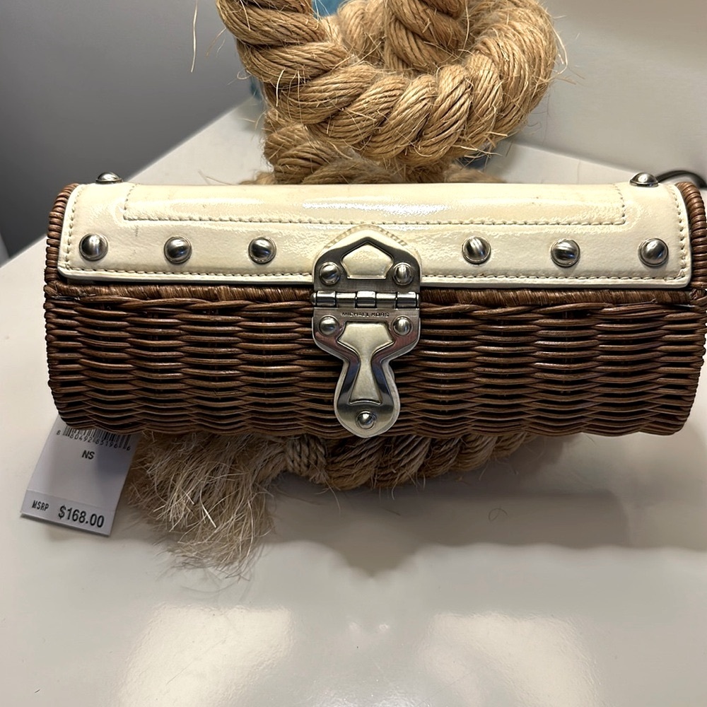 New with tags! Amazing wicker and leather clutch